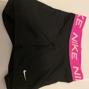 nike pros with pink waist band